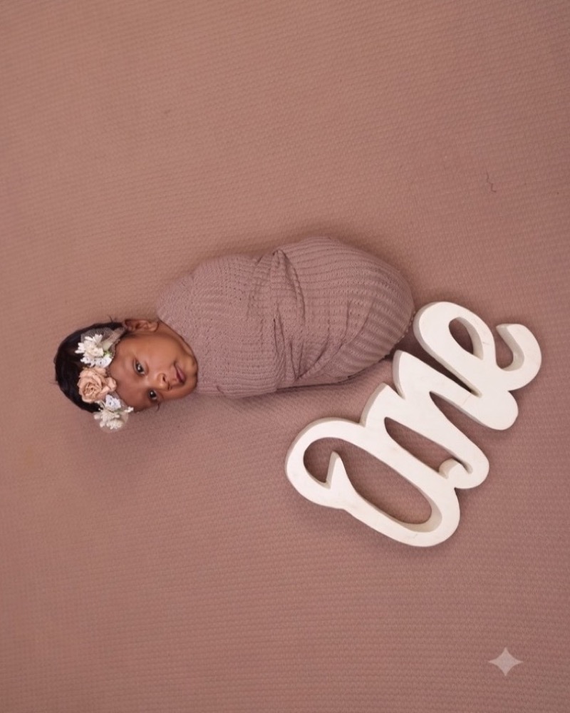 Newborn baby sleeping peacefully in a premium setup